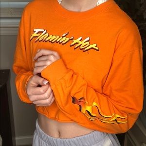 Orange Cheetos sweatshirt